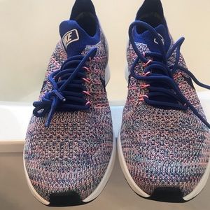 Nike pink and blue women size 7.5 flyknits.